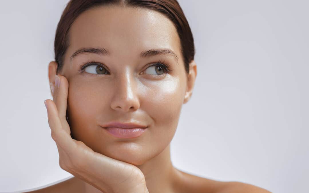 Beauty Photo of Woman with Clean and Healthy Skin Touching Her Face